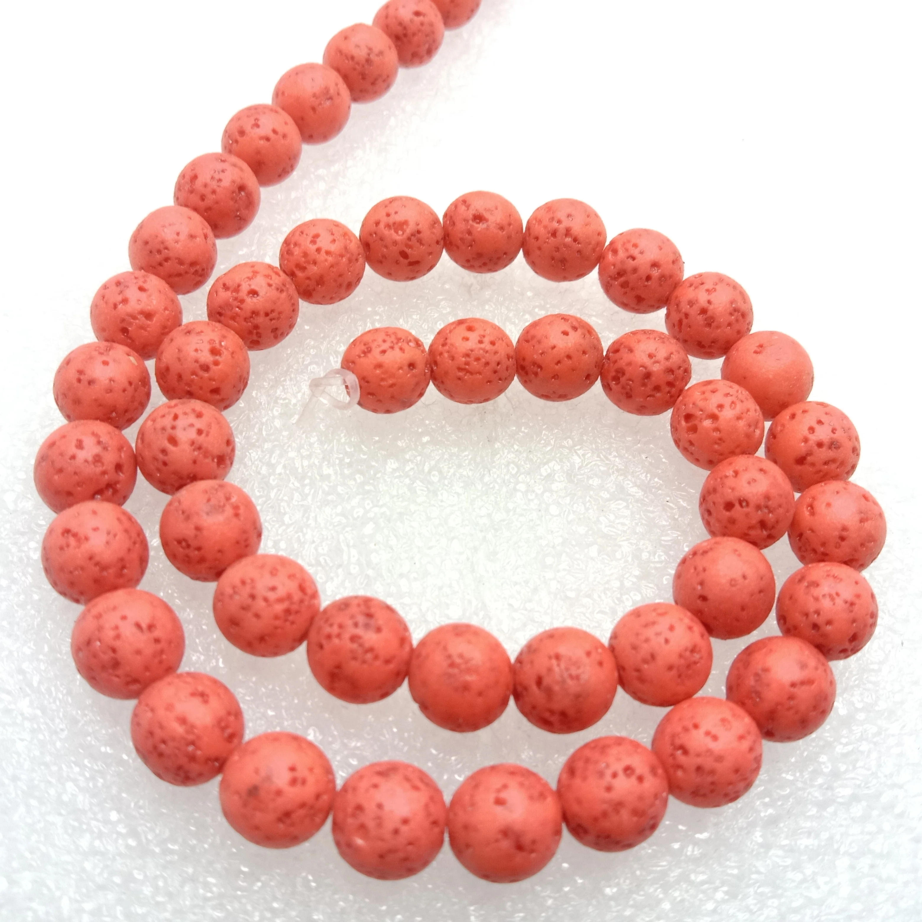 Peach round shape lava beads 8 mm 1 string