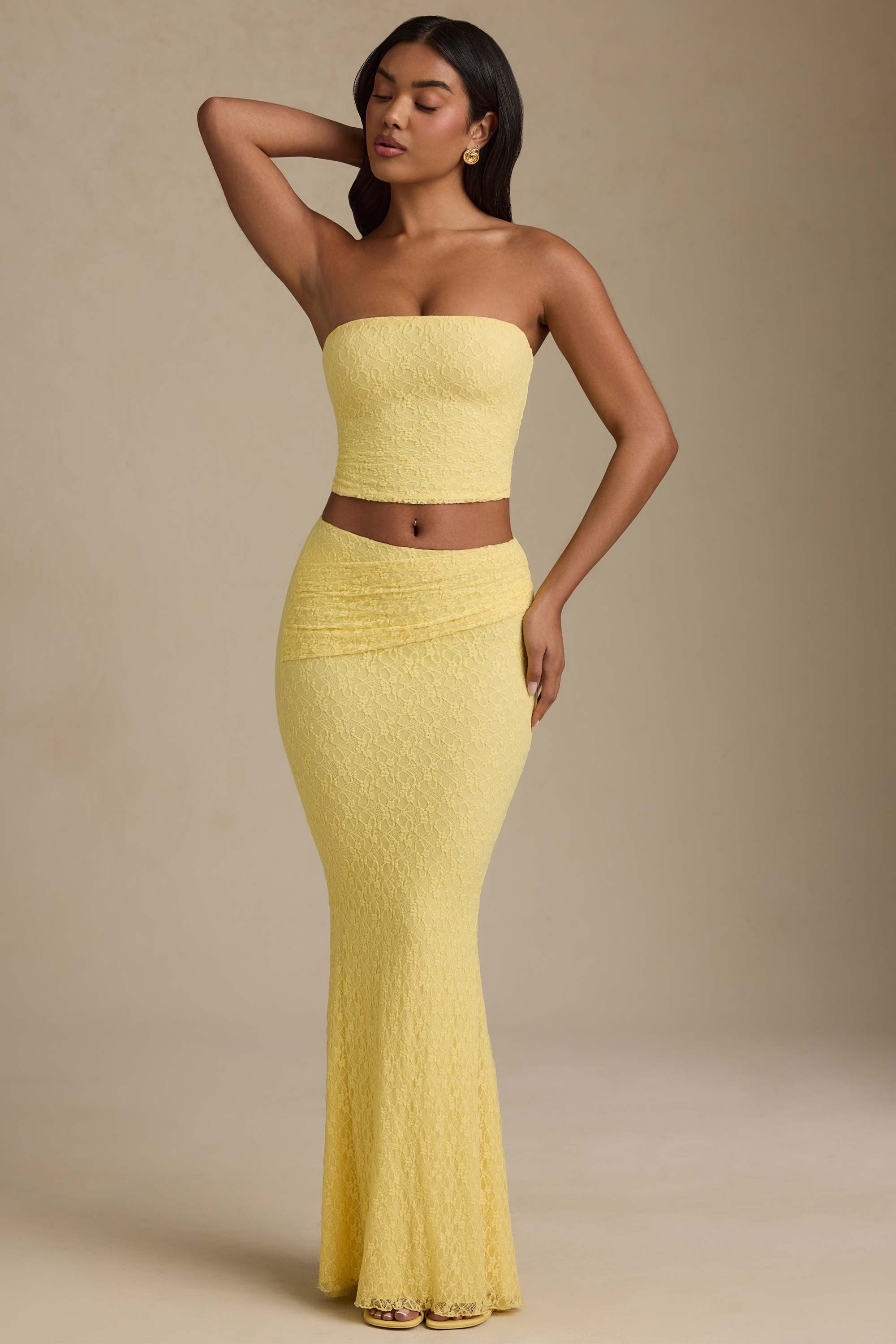 Vanda-Draped Low-Rise Lace Maxi Skirt in Pastel Yellow