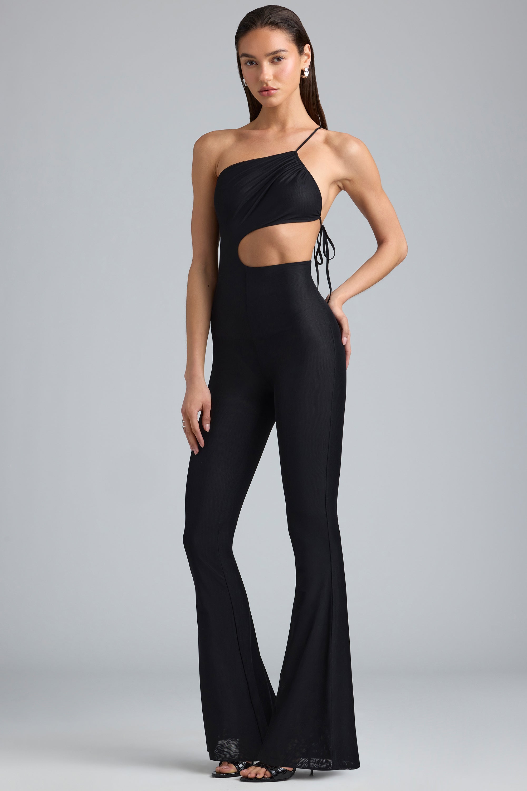 Amara-Petite Metallic Ruched Cut-Out Flared Jumpsuit in Black
