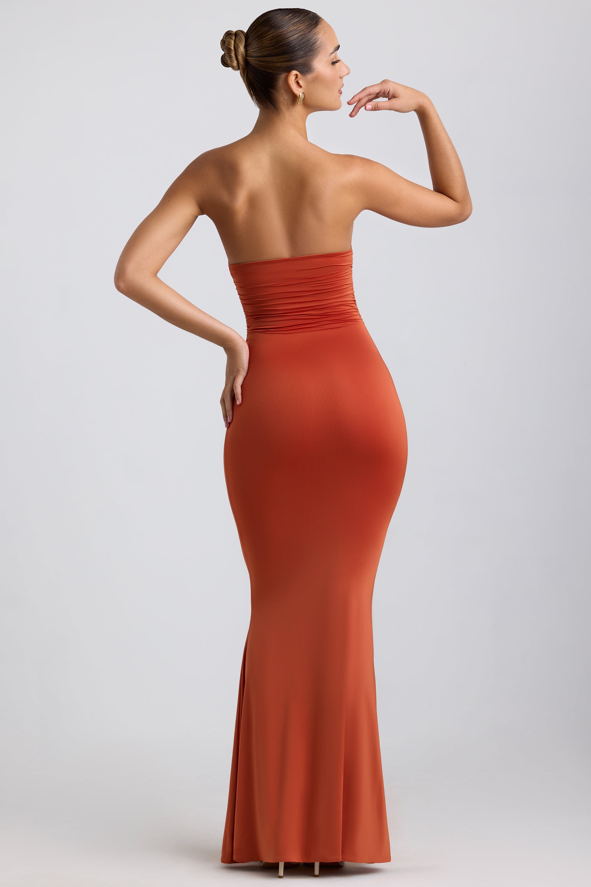 Kehlani-Slinky Jersey Hardware Detail Strapless Maxi Dress in Burnt Orange