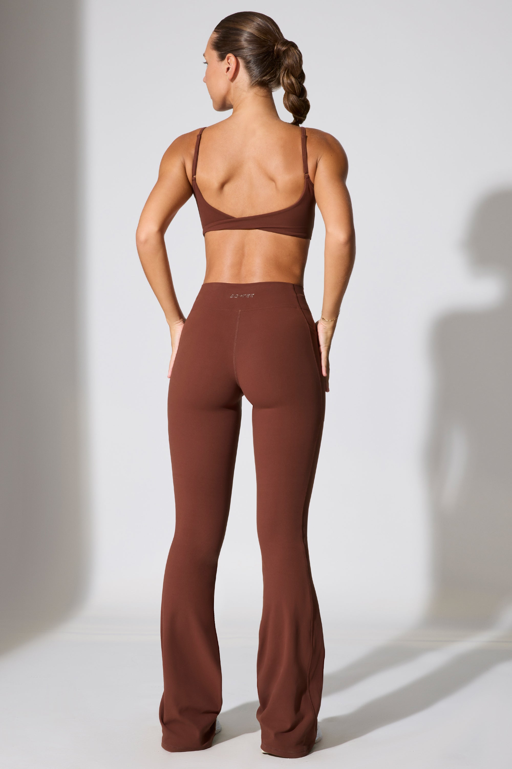 Twist Waist Flare Leggings in Brown