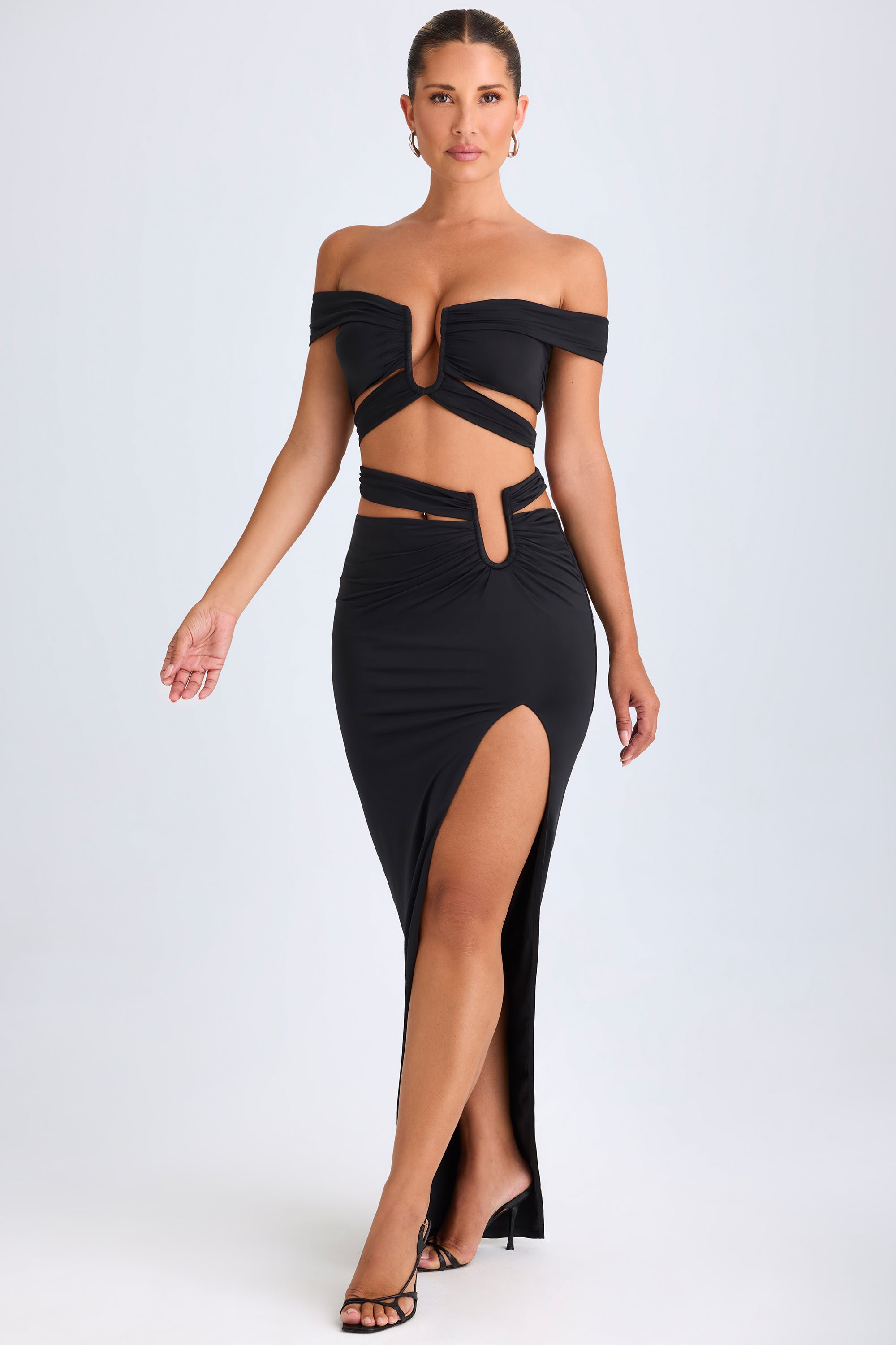 Urara-Asymmetric Cut-Out Maxi Skirt in Black