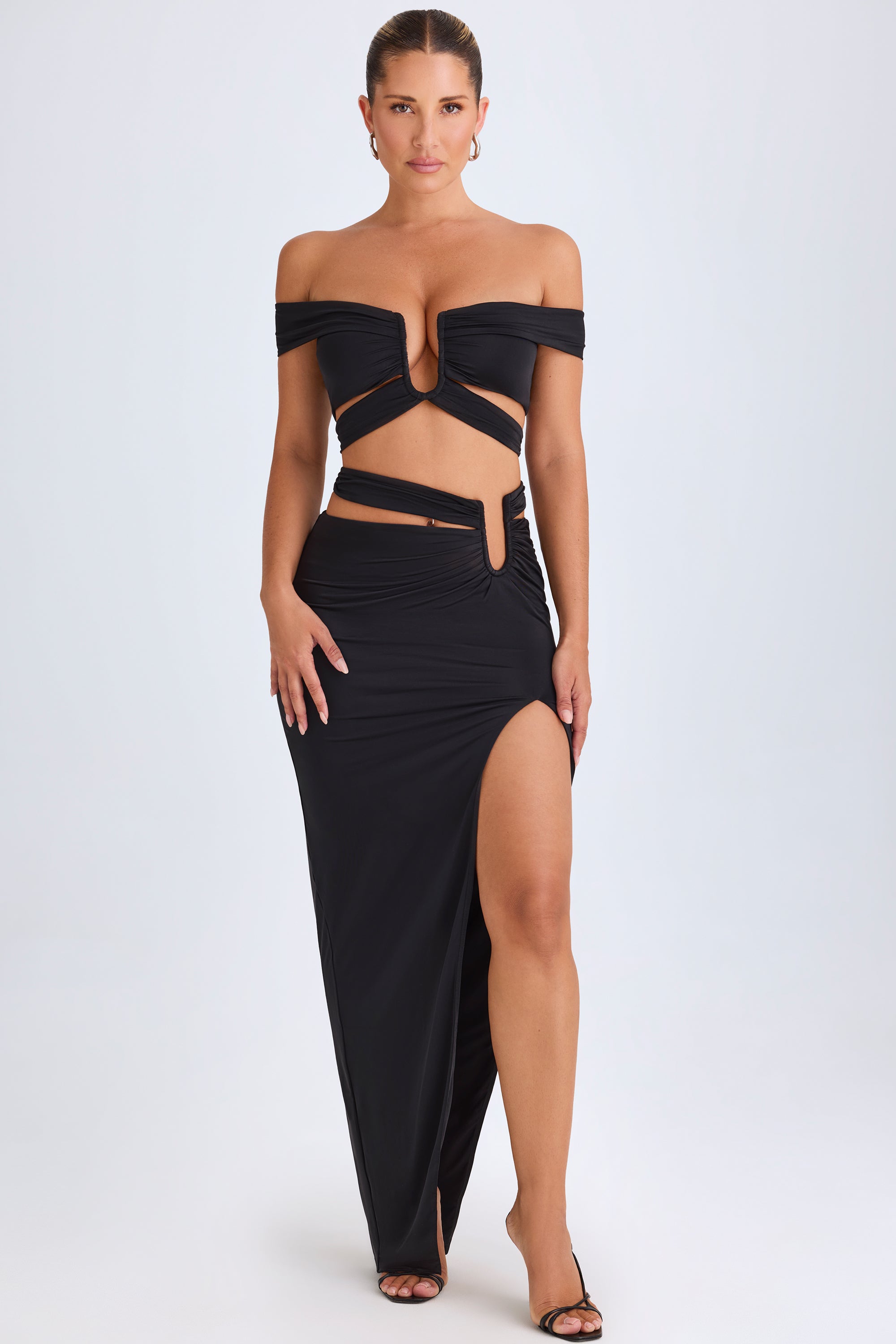 Urara-Asymmetric Cut-Out Maxi Skirt in Black
