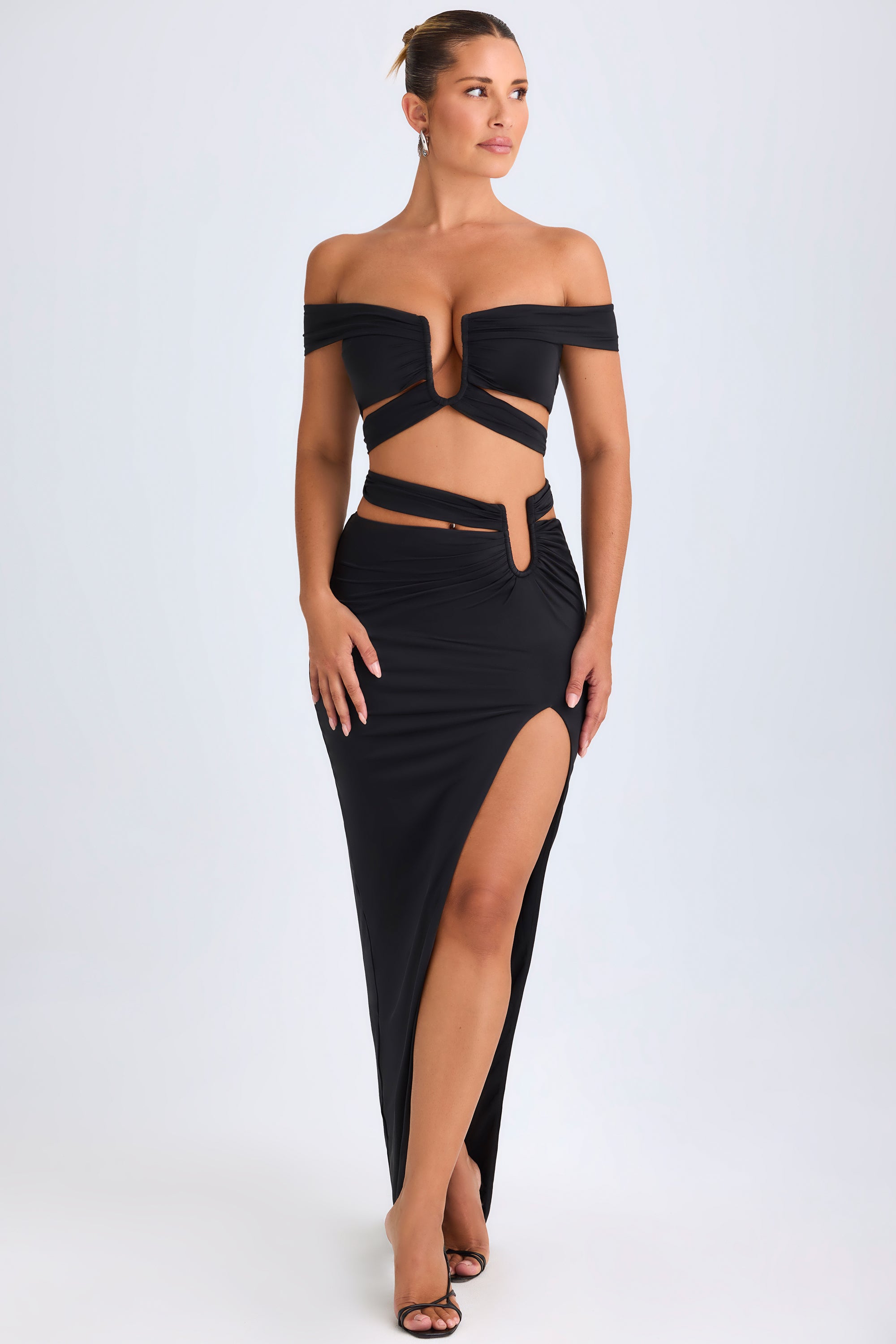 Urara-Asymmetric Cut-Out Maxi Skirt in Black