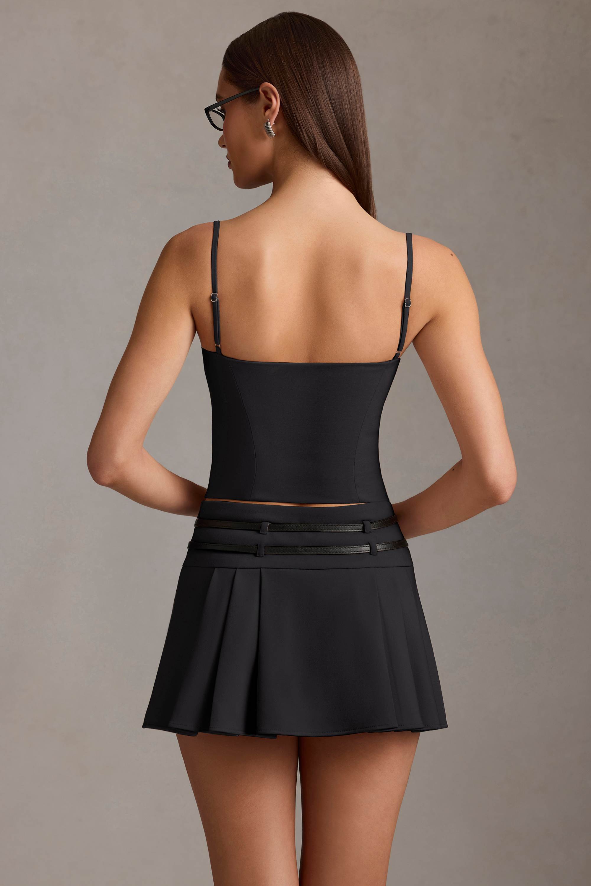 Velora-Belted Low-Rise Pleated Mini Skirt in Black