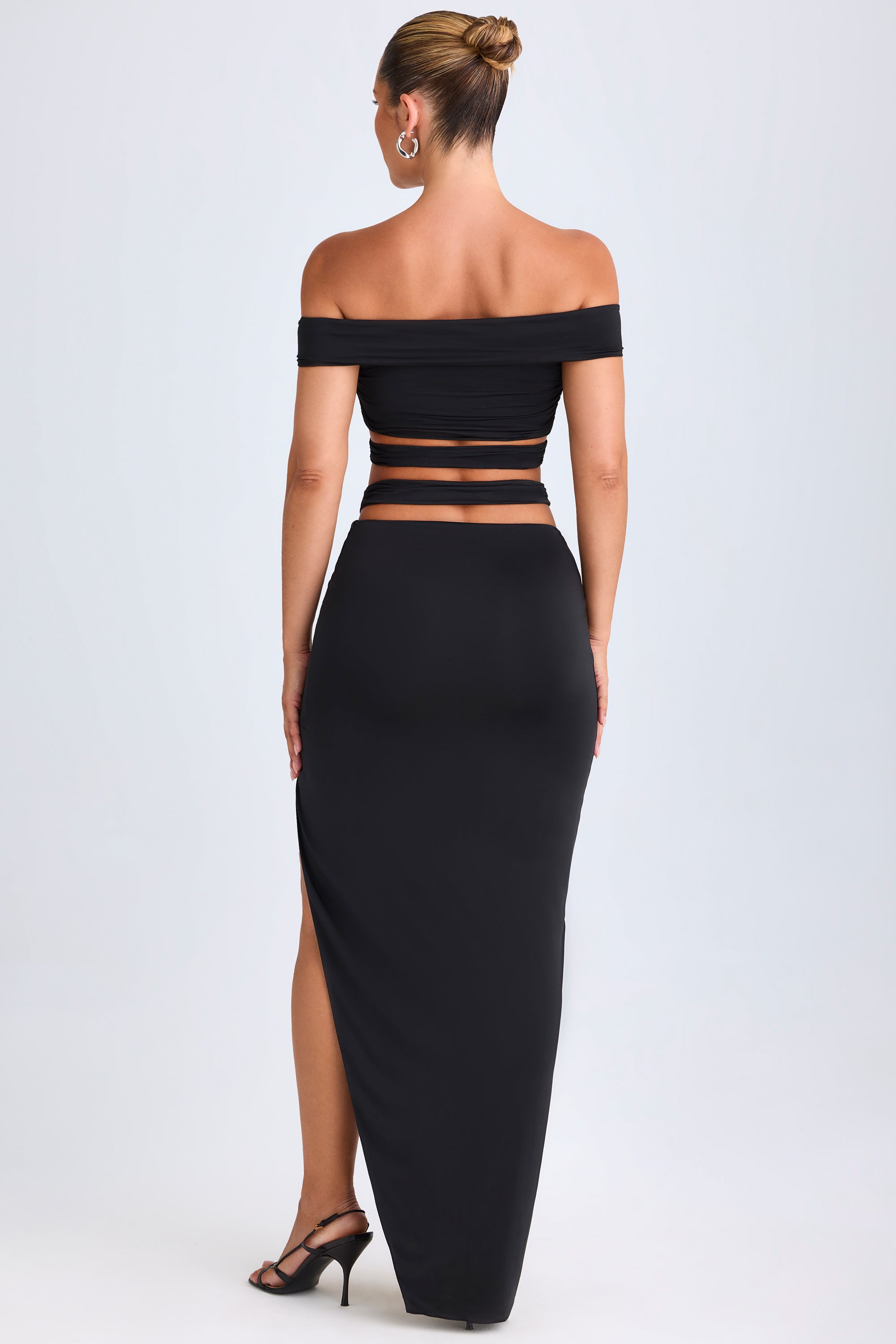 Urara-Asymmetric Cut-Out Maxi Skirt in Black