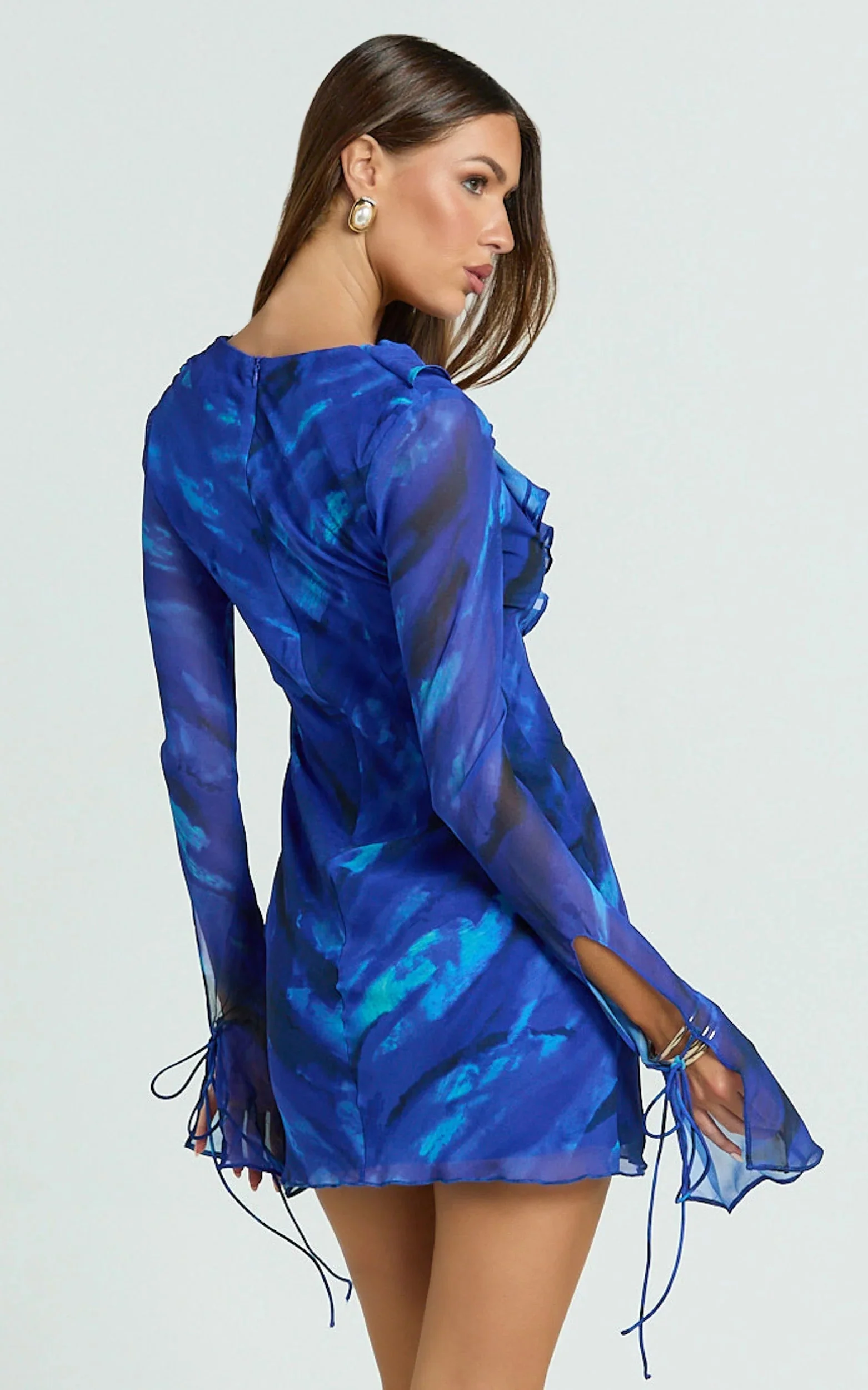 Alesya Mini Dress Ruffle Plunge Neck Long Sleeve Tie Detail Dress in Blue Abstract