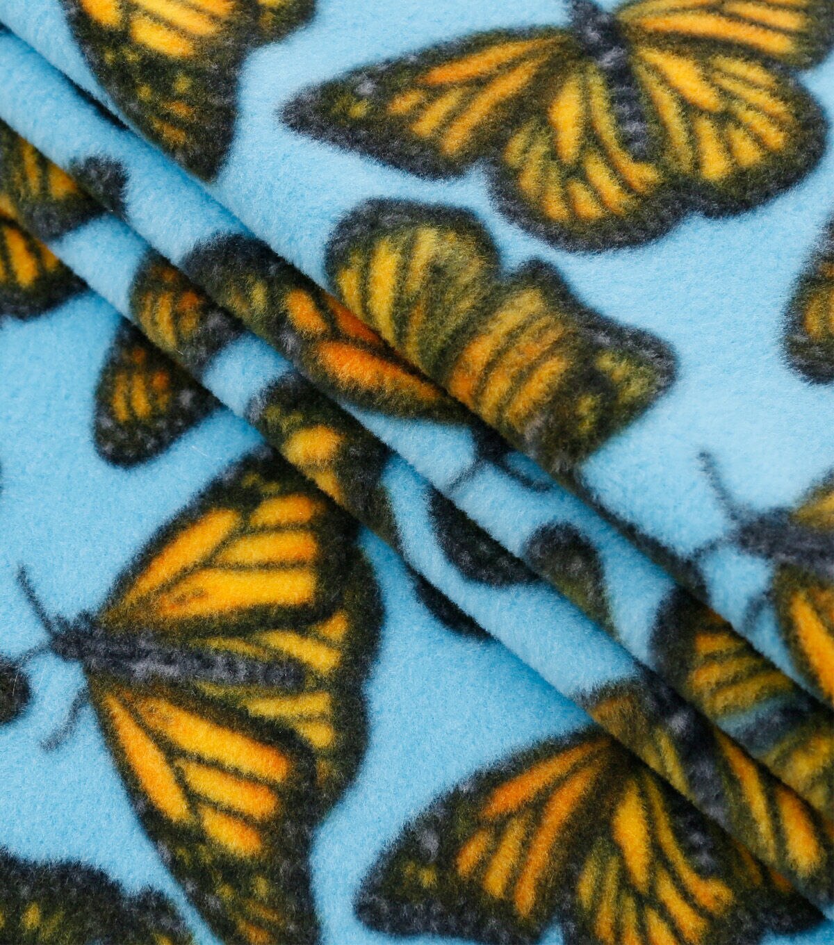 Monarch Butterflies on Blue Anti Pill Fleece Fabric