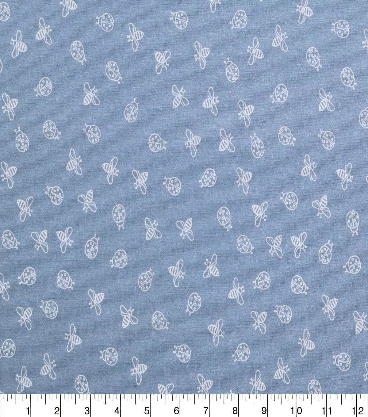 White Insects on Dusty Blue Quilt Cotton Fabric by Quilter's Showcase