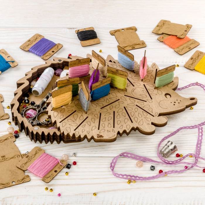 Box for handicraft + 26 bobbins 